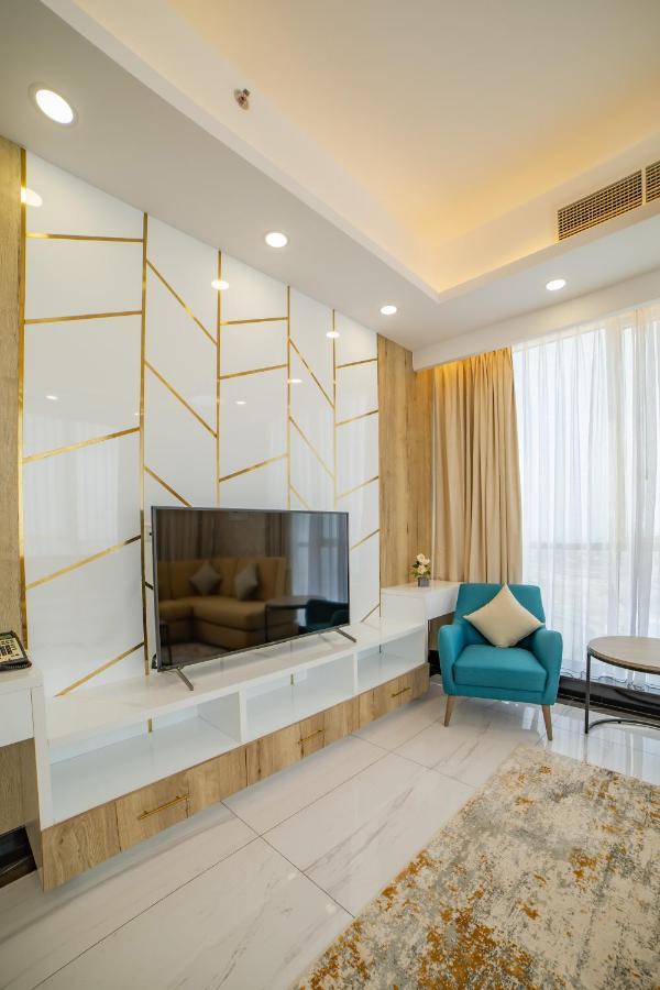 Platinum Coast Hotel Apartments Al Fujayrah Exterior foto A television set