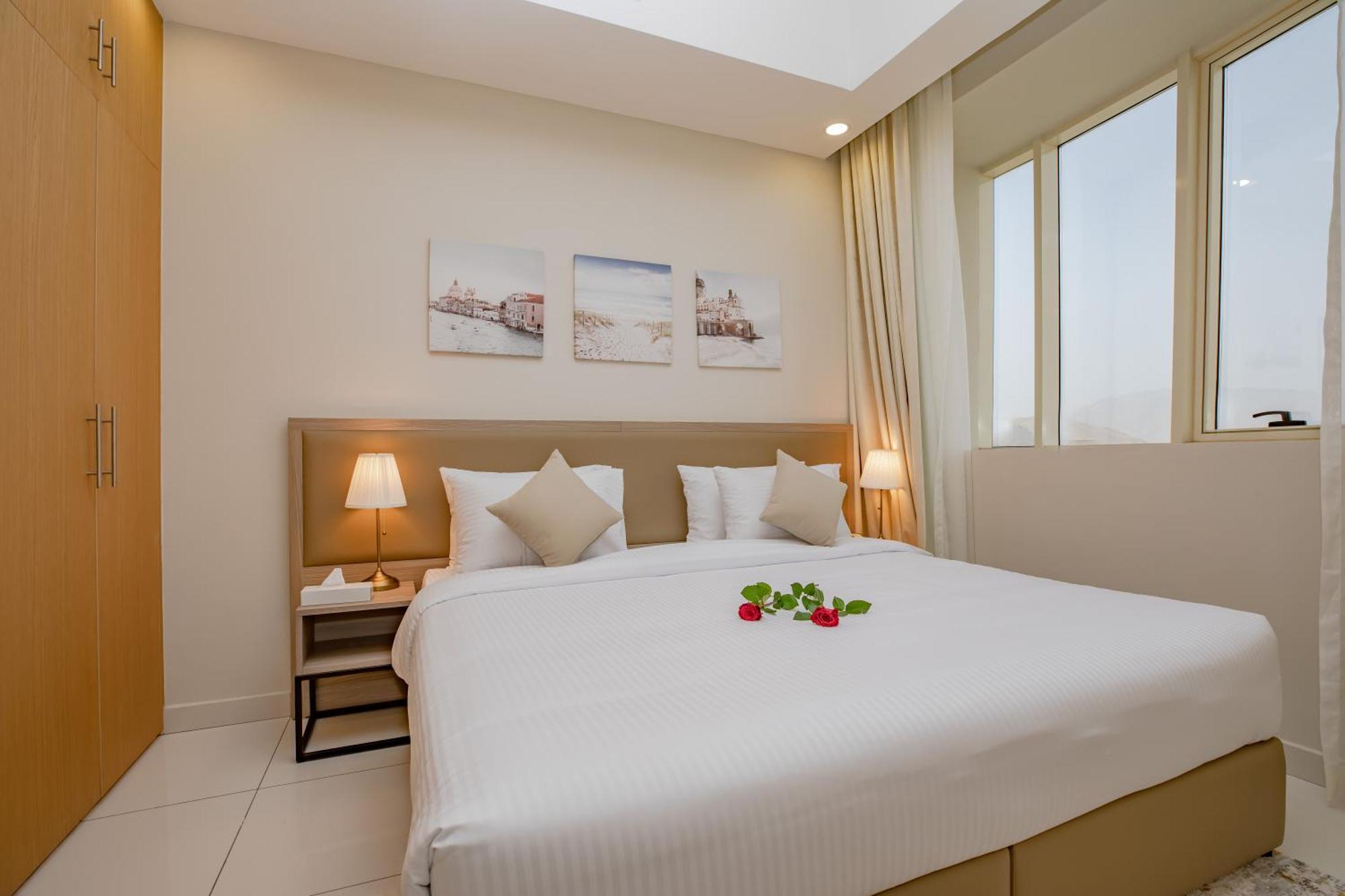 Platinum Coast Hotel Apartments Al Fujayrah Quarto foto A bedroom in a hotel